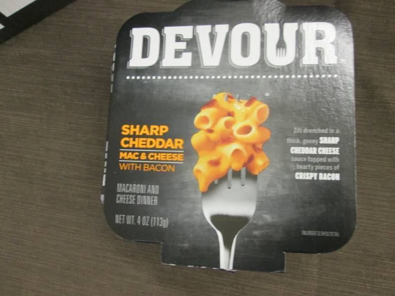 lot 80 image: Case of 6- 4 oz Devour Sharp Chedda...