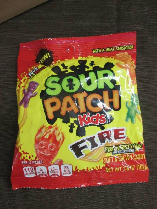lot 85 image: Case of 12 - 3.6 oz Sour Patch Kids...