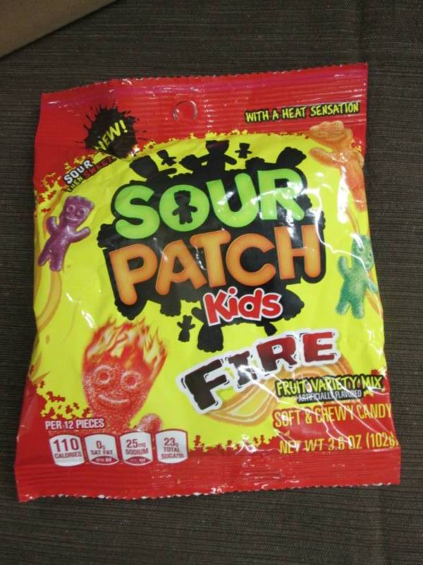 lot 87 image: Case of 12 - 3.6 oz Sour Patch Kids...