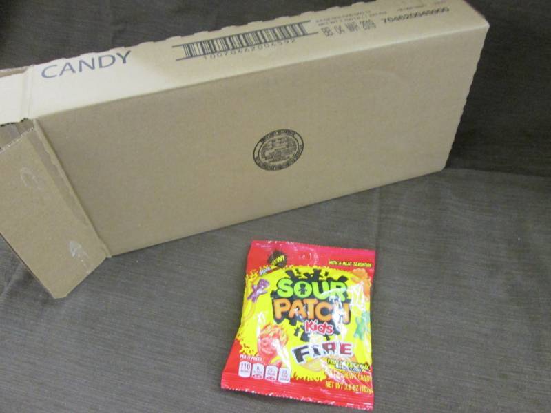 lot 89 image: Case of 12 - 3.6 oz Sour Patch Kids...