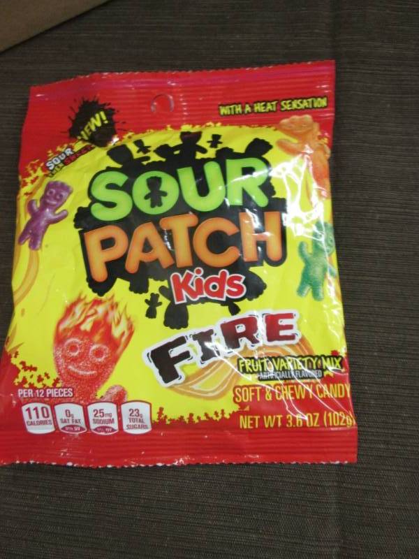lot 91 image: Case of 12 - 3.6 oz Sour Patch Kids...
