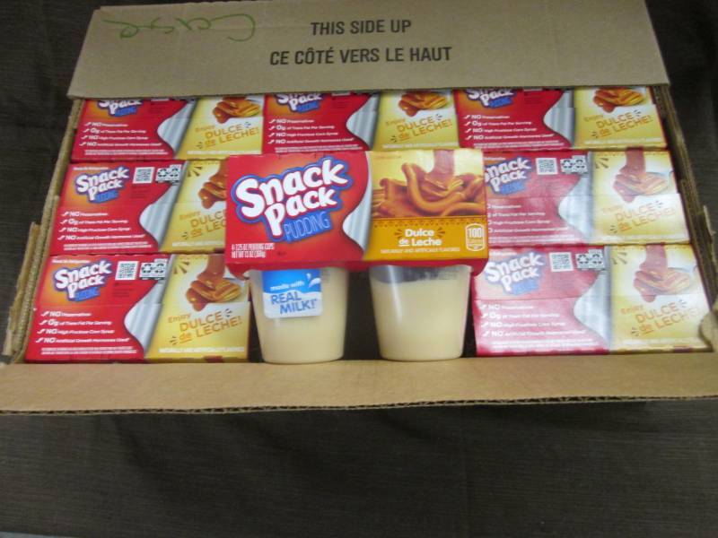 lot 104 image: Case of 12- 43.25 pks Snack Pack P...
