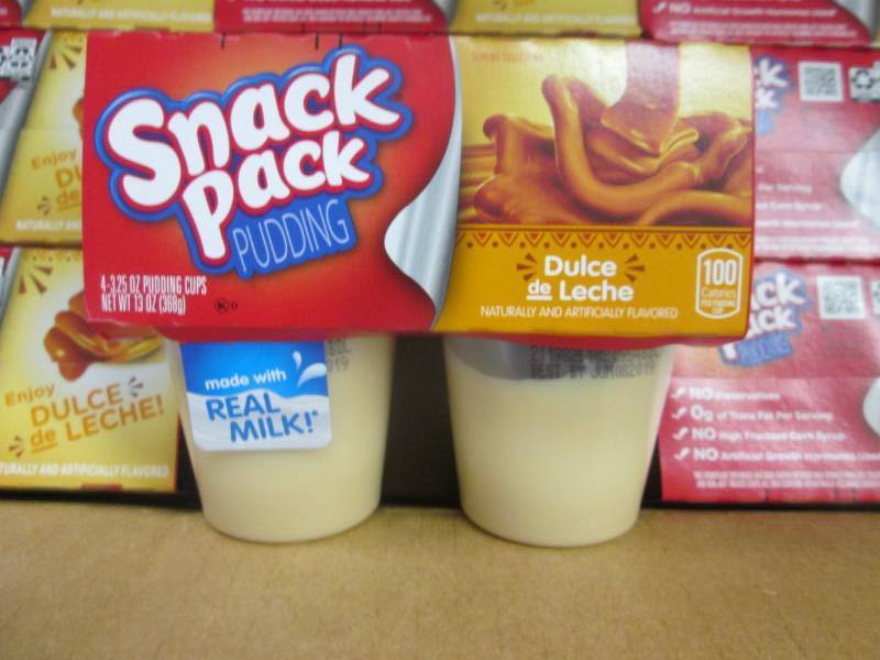 lot 105 image: Case of 12- 43.25 pks Snack Pack P...