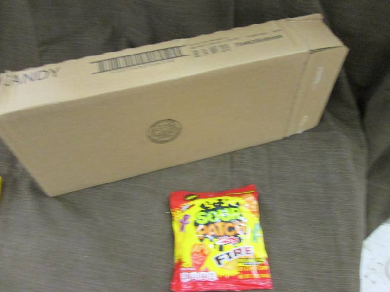 lot 117 image: Case of 12 - 3.6 oz Sour Patch Kids...