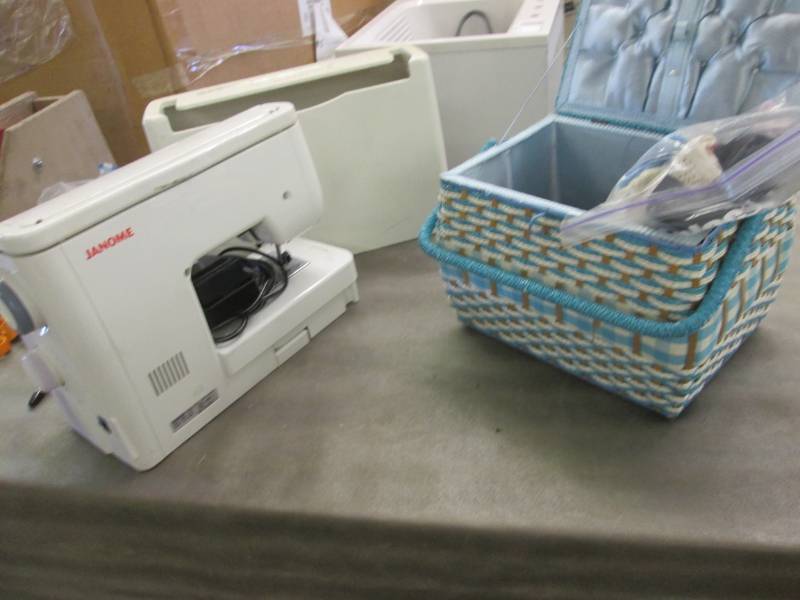 lot 185 image: Janome Sewing Machine, Sewing Baske...