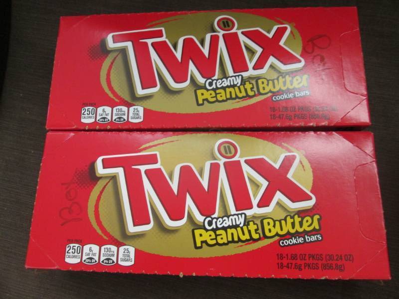 lot 219 image: 2 Boxes of 18-1.68 oz Twix Cookie B...