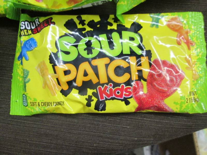 lot 306 image: 12 - 2 oz Pks Sour Patch Kids Candy...