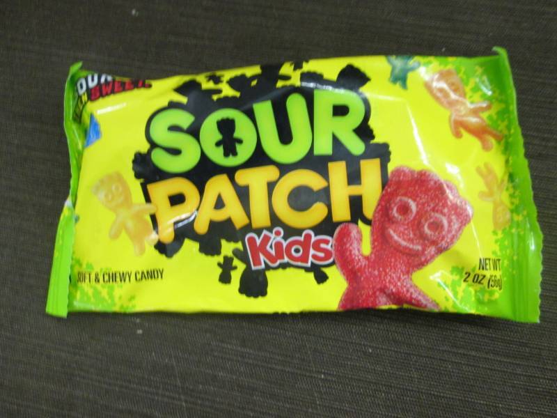 lot 307 image: 12 - 2 oz Pks Sour Patch Kids Candy...