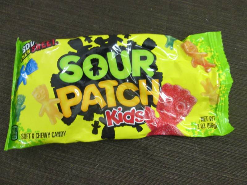 lot 309 image: 12 - 2 oz Pks Sour Patch Kids Candy...