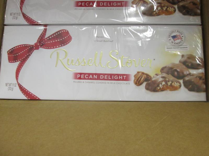 lot 338 image: 6- 11 oz Boxes Russell Stover Pecan...