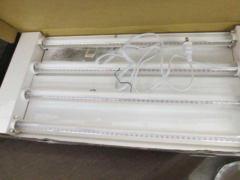 lot 393 image: Feit Electric 2 ft. 4-Light 60-Watt...