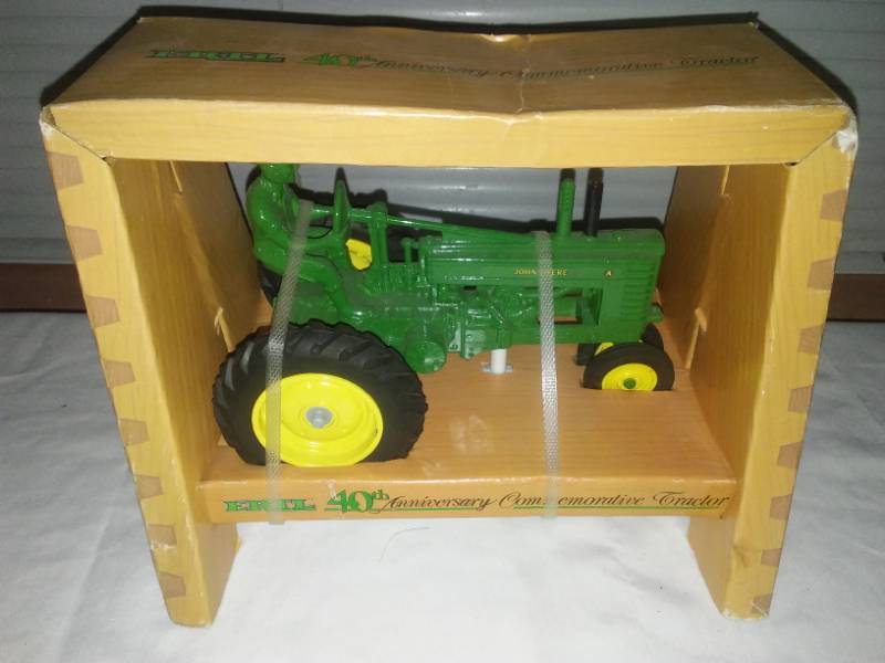 lot 13 image: John Deere Ertl 40th anniversary tractor. New in box