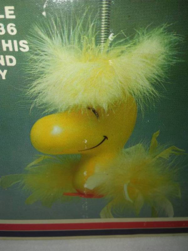 lot 22 image: Chirping Woodstock in box, Copyright 1965.
