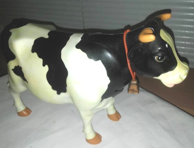 lot 30 image: Holstein cow with real cowbell. Udderly cool.