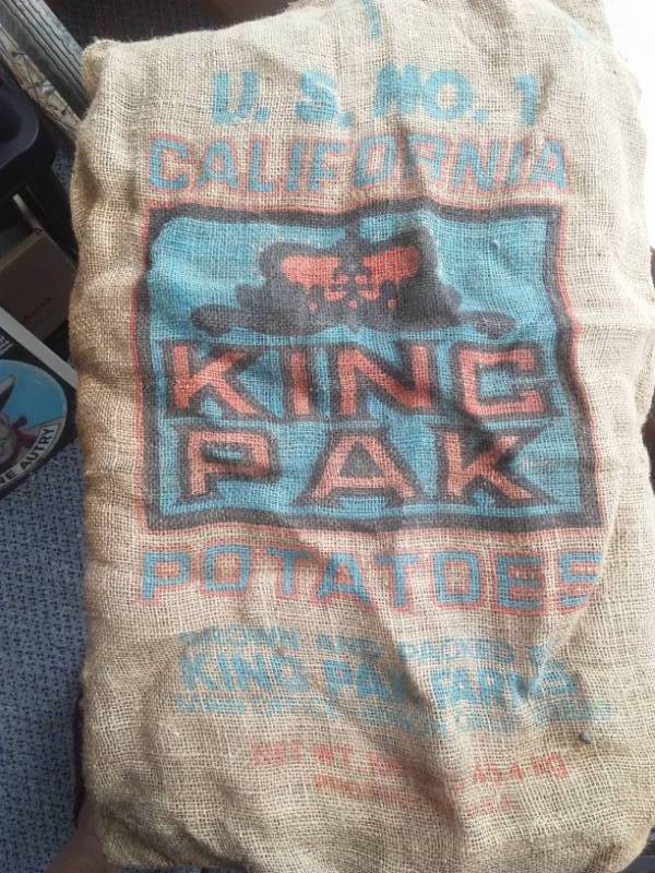 lot 63 image: Potato burlap sack, gunny sack, King Pak Farms