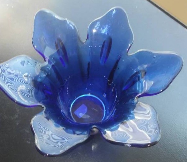 lot 90 image: White and blue glass.
