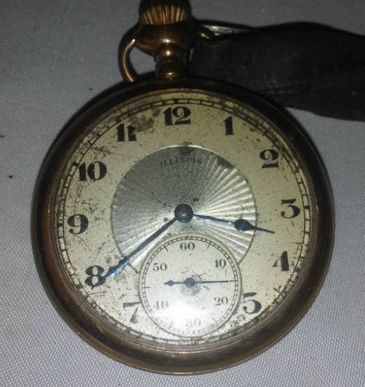 lot 181 image: Illinois pocket watch with leather strap.