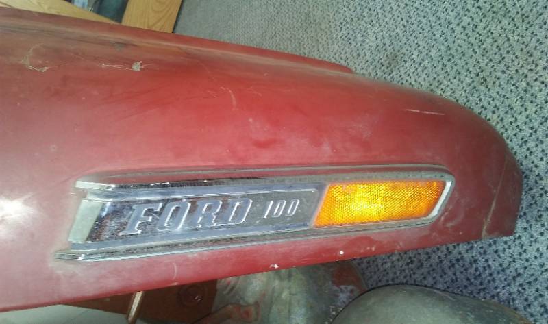 Red Ford 100 truck hood.