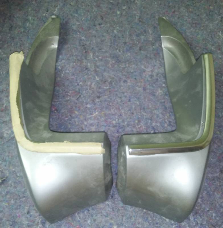 Rear quarter panel extensions with chrome trim - excellent. Original