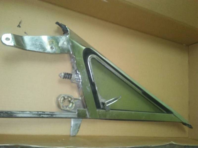 Left and right front side vent windows and Hardware - excellent. Original