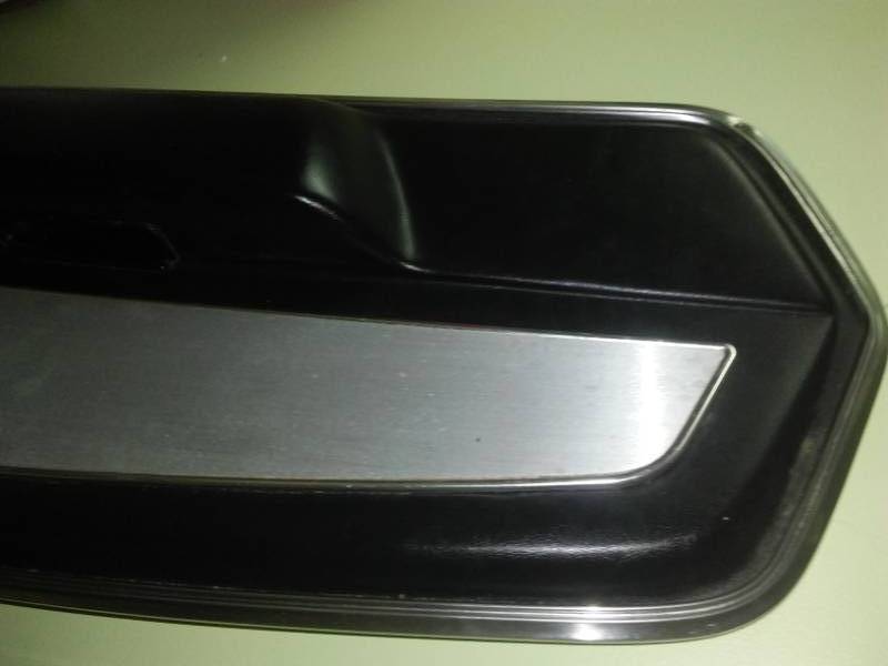 Deluxe black interior door panels with aluminum inserts. Original