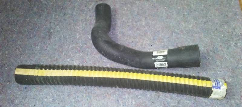 Gates and Napa new radiator hoses. Upper and lower.