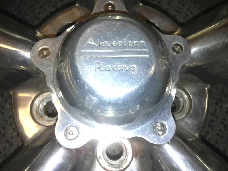4 American Racing Torque Thruster II Polished Aluminum Rims.