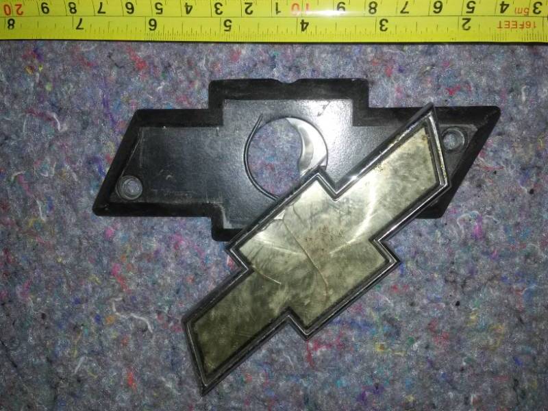 Chevy Truck lid key guard bow tie gold