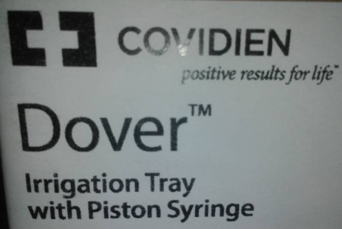 lot 213 image: One case of 20 Covidien Dover irrigation tray with piston syringe