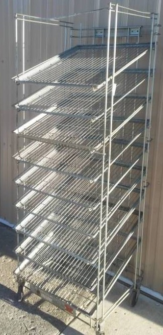lot 289 image: Metal bread 9 rack on casters and Trays. 6-foot, excellent, heavy duty