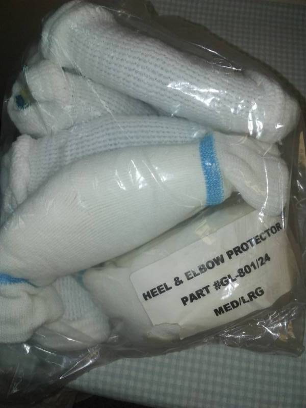 lot 295 image: 7 heel and elbow protectors, new  in bag.