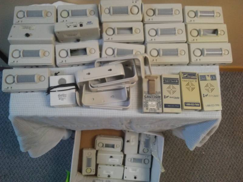 lot 297 image: Two dozen UMP infrared bedside monitors, some mounting brackets and more.
