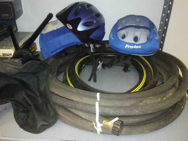 lot 202 image: Hoses, Camp stool, bicycle helmets.