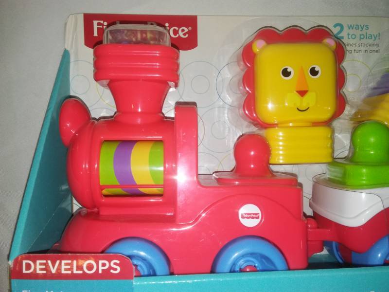 lot 136 image: New Fisher-Price - little stackers lion locomotive.