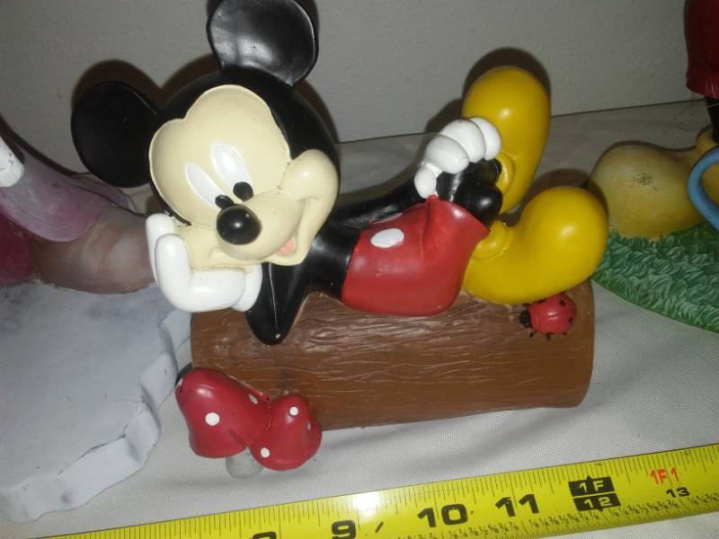 lot 180 image: Three Mickey Mouse figurines.