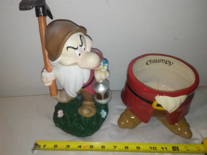 lot 183 image: Grumpy flowerpot and solar statue.