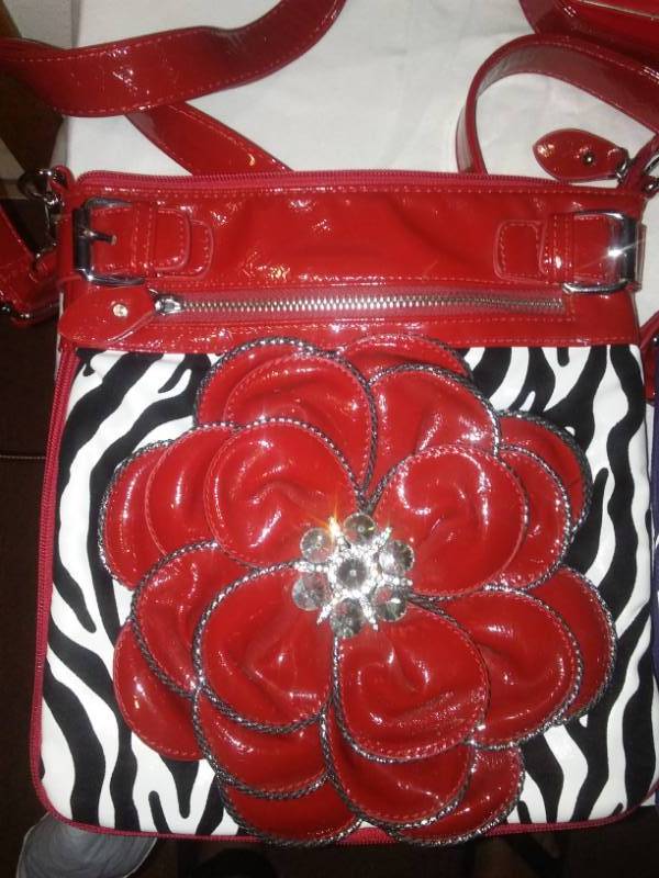 lot 295 image: Womens purses bags and Survivor socks.