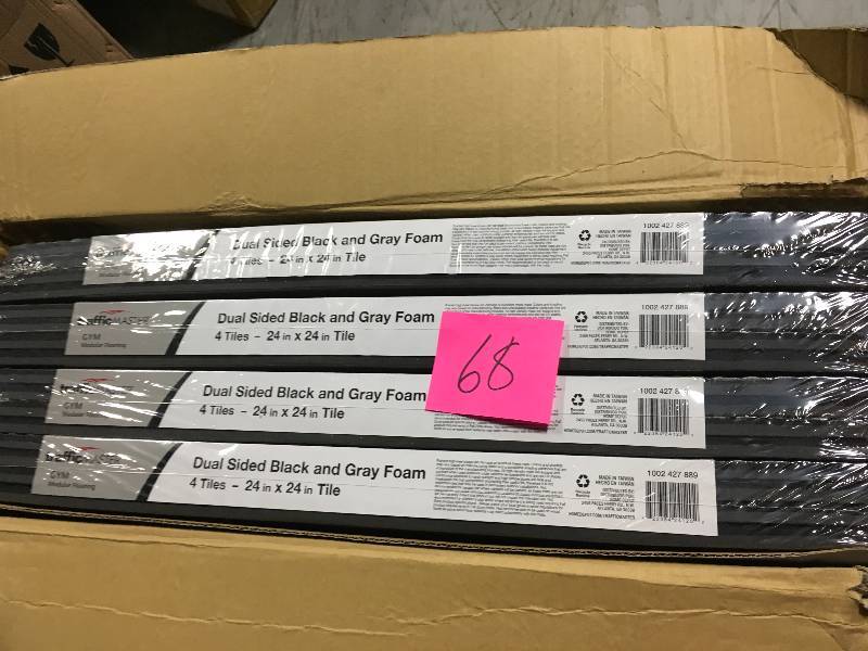 lot 68 image: TrafficMASTER BlackGray 24 in. x 24 in. x 0.47 in. Dual Sided Gym Floor (4-Pack) not used