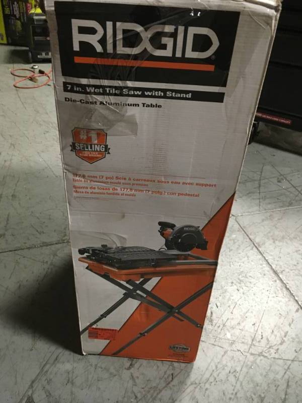 lot 67 image: RIDGID 7 in. Tile Saw with Stand in good condition