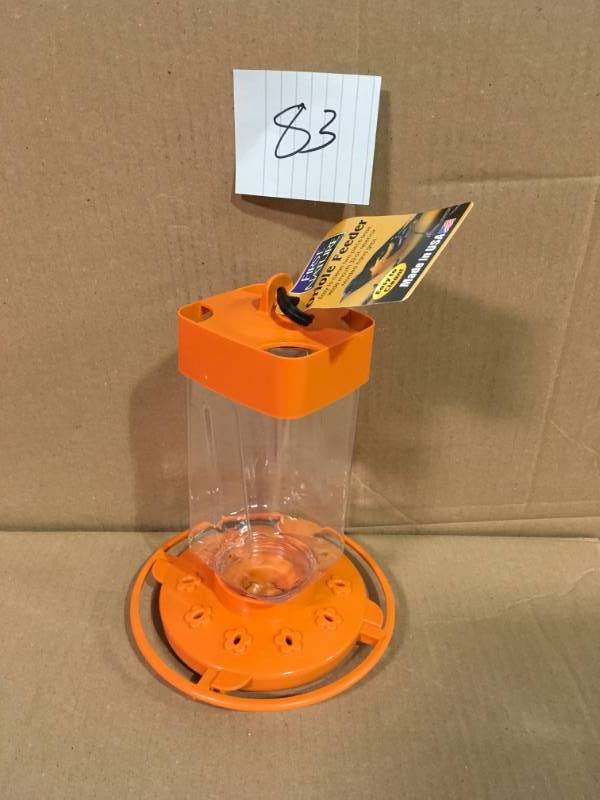lot 83 image: First Nature Wildlife Feeders 32 oz. Oriole Feeder Orange feeder and clear reser not used