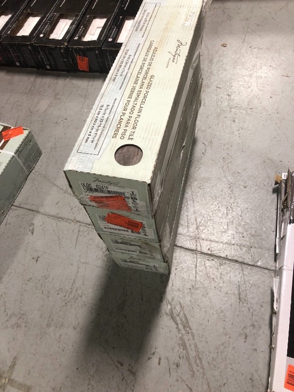 lot 123 image: Marazzi Montagna Wood Weathered Brown 6 in. x 24 in. Porcelain Floor and Wall Tile (14.53 sq. ft.  case) 4 cases no used