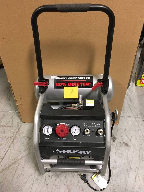 lot 7 image: Husky 4.5 Gal. Portable Electric-Powered Silent Air Compressor in good condition