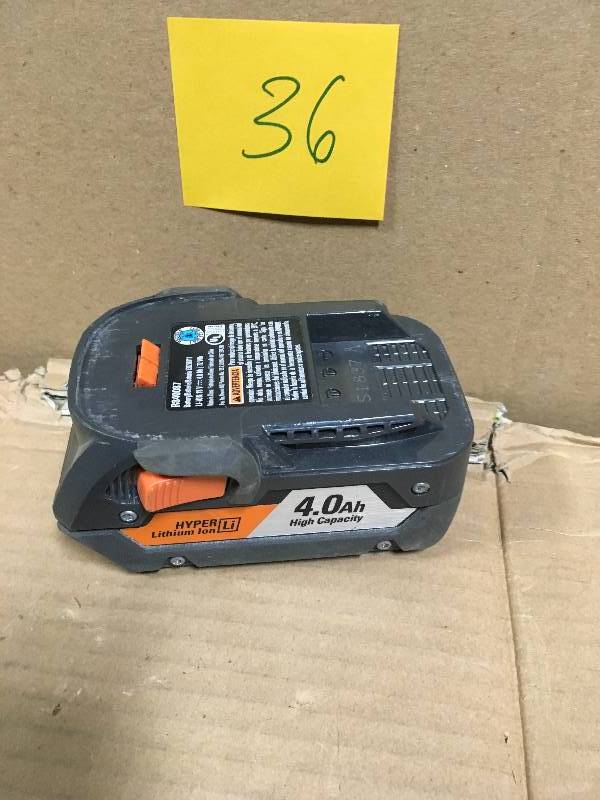 lot 36 image: Ridgid 18-Volt Lithium Ion 4-AmpHour Battery Pack R840087 # 130218009  in good condition