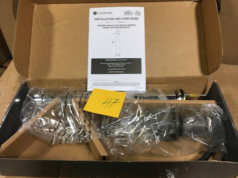 lot 47 image: Glacier Bay Modern Single Hole Single-Handle Vessel Bathroom Faucet in Brushed Nickel with Drain  in good condition