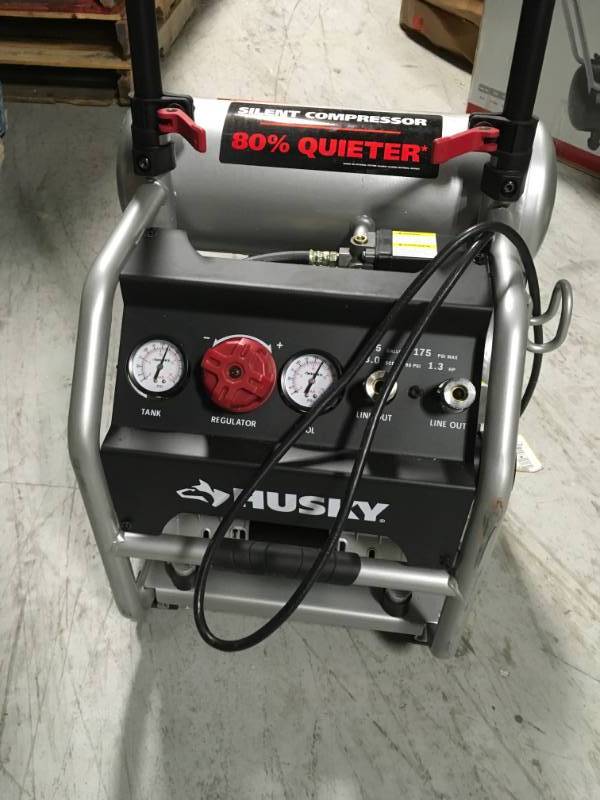 Husky 4.5 Gal. Portable Electric-Powered Silent Air Compressor in good condition
