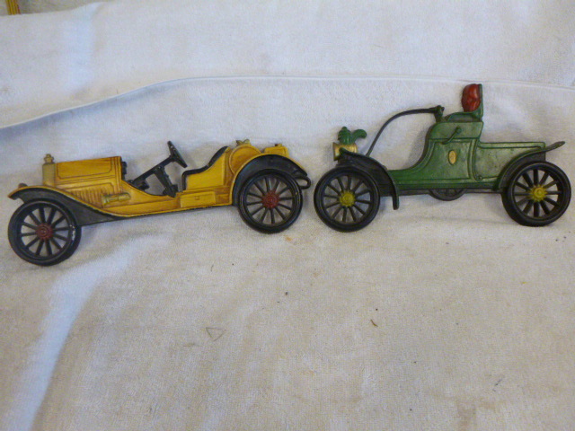 lot 69 image: 2 Metal Wall Hanging Cars