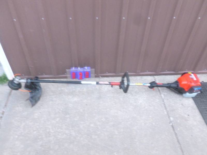 lot 20 image: Troy Built Gas Line Trimmer