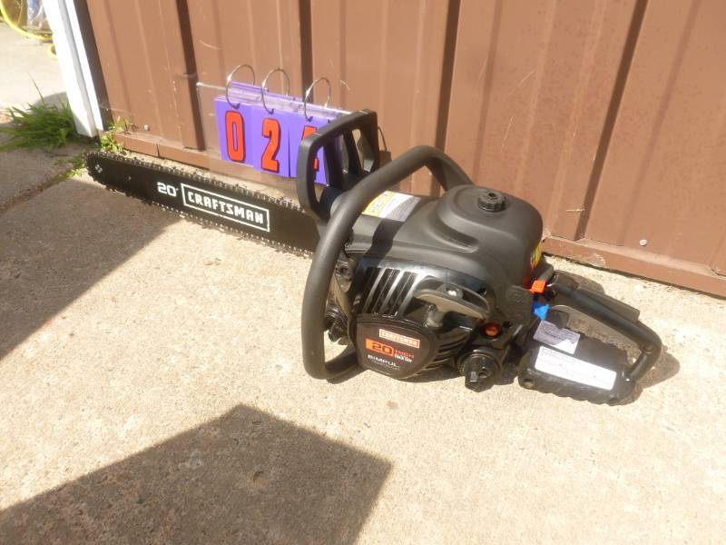 lot 24 image: Craftsman 20 Gas Powered Chain Saw