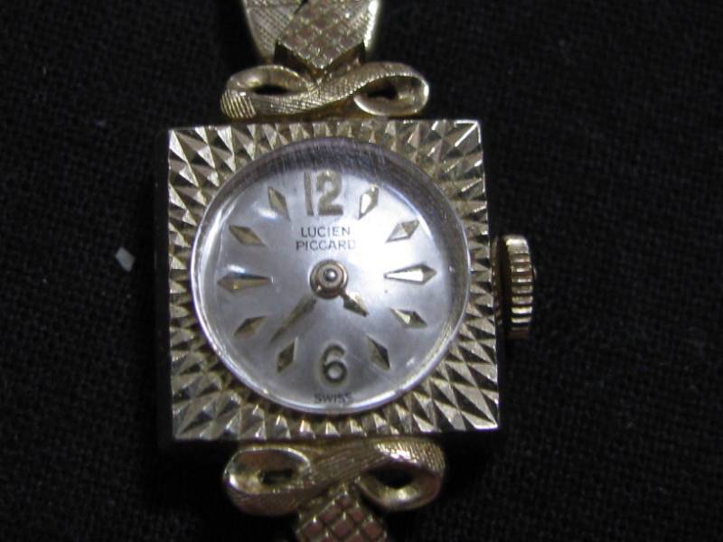 lot 16 image: Lucien Piccard 14K Gold Watch