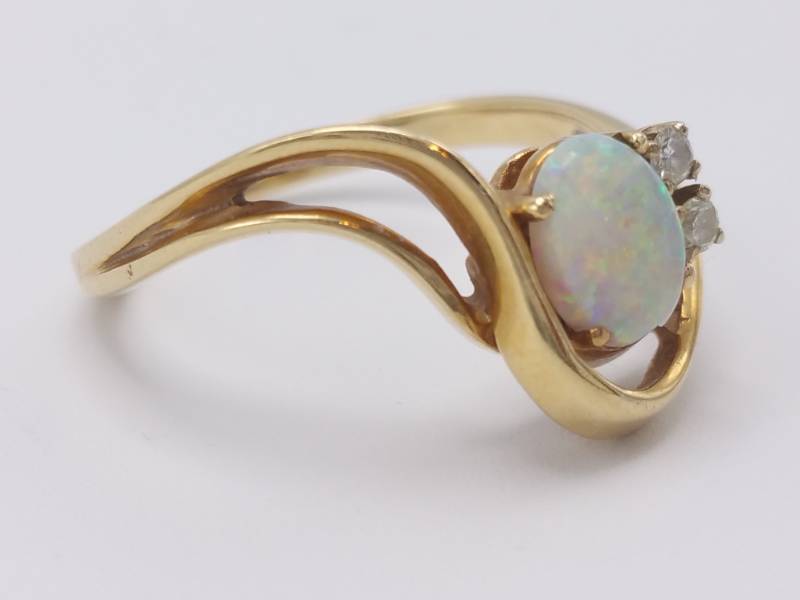 lot 28 image: Elegant Opal and Diamond Estate Ring in 14k Yellow Gold